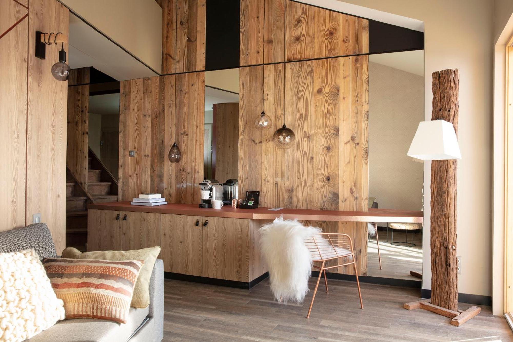 Grandes Rousses Hotel & Spa Alpe d'Huez Exterior foto Interior of a chalet