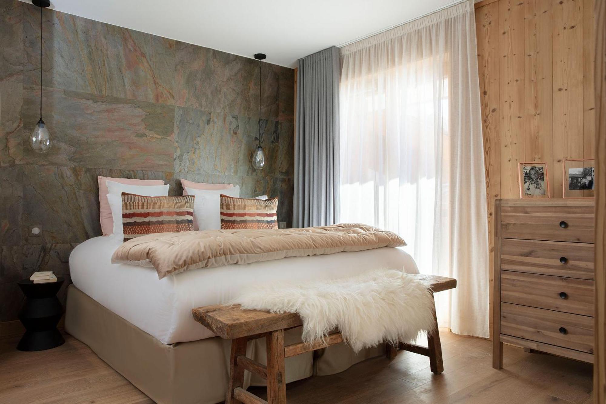 Grandes Rousses Hotel & Spa Alpe d'Huez Exterior foto A bedroom in the hotel